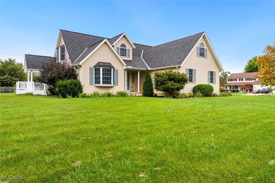Welcome to this beautifully appointed Cape Cod, situated on a spacious .41-acre corner lot in the Homestead Vineyards community of North Ridgeville. Offering an ample 1,880 square feet of living space, this home features three bedrooms and two and a half baths and a large 2 car garage. Step inside the entryway that flows into the formal dining room with built-ins and easy access to the upgraded kitchen. The kitchen boasts stainless steel appliances, newer cabinetry, ample prep space, and a dining area with a slider leading to the covered deck and backyard. The vaulted living room is highlighted by a cozy stone fireplace and luxury vinyl flooring, creating a warm and inviting space. On the main level, you’ll find the primary bedroom complete with a full ensuite featuring a vanity, soaking tub, stand-up shower, and generous closet space. A half bath and laundry room complete the first floor. Upstairs, there are two sizable bedrooms and a full bath. The unfinished basement provides endless opportunities for customization and additional living space. Outside, enjoy the large yard, storage shed, and plenty of room to make the property your own.