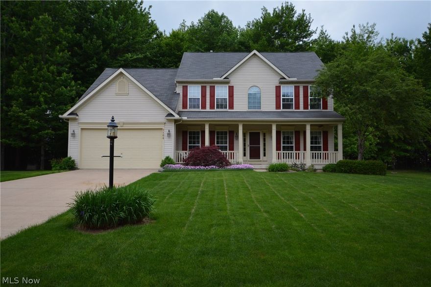 Falls Pointe colonial on beautiful cul de sac lot.  This spacious four-bedroom home has been lovingly cared for by one owner since built and has been beautifully updated.  Full front porch enters to a two-story foyer with wood flooring leading all the way through to the eat-in kitchen.  To the left of the foyer, French doors lead to a bright office area.  To the right is a formal living room flowing to dining room with beautiful wainscoting and crown molding.  Kitchen features granite countertops, large island, Bosch dishwasher, LG double oven range, side by side refrigerator, spacious eating area and door to back yard.  Enjoy warm summer evenings on the fabulous paver patio with raised beds and amazing treed back yard.  Family room with vaulted ceiling and gas fireplace.  Tasteful half bath and large mudroom leading to two-car attached garage.  Second floor offers four bedrooms, including an oversized master suite with large walk-in closet and ensuite bathroom with double sinks.  The