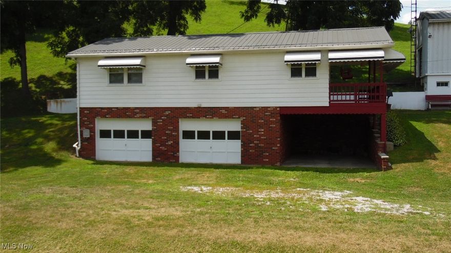 Immaculate ranch home in Riverview School District and minutes from downtown Coshocton. This home is in move-in condition with first floor laundry, 2 bedrooms, full bath, eat-in kitchen plus comfortable living room. There is a 2 car attached garage. This property is great for 18 wheelers or for a car collector. The full basement includes 2 Garages plus newer furnace and central air. There is a private deck and patio. All this is on 1.795 Acres. Immediate possession possible.