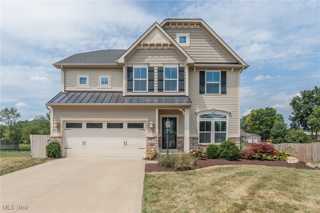 Welcome to this spacious 4-bedroom Colonial in the desirable Wicker Creek development, located in Plain Local Schools. Built in 2014 and offering 2,408 sq ft of living space, this home features 2 full and 2 half baths, a 2-car garage, and a finished basement, adding another 466 sq feet—perfect for additional living or entertaining space. Inside, you'll find fresh paint throughout and brand new carpet, making it truly move-in ready. Enjoy the open layout, generously sized bedrooms, and a convenient location close to schools, shopping, and dining. A great opportunity to own a well-maintained home in a sought-after neighborhood!