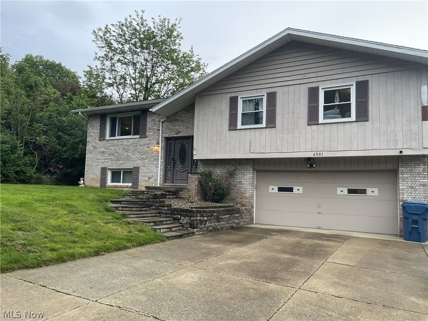 Spacious bi-level home situated on over a half-acre in the City of Green and located in desirable Green Local School District! The updated kitchen features soft-close cabinetry, stylish finishes, and a breakfast bar that opens to the dining and living areas, creating a comfortable layout for everyday living and entertaining. The main level features a LARGE owner’s suite with private bath, along with two additional bedrooms and another full bath. The lower level offers an exceptionally spacious rec room with half bath, providing plenty of additional living or recreational space. Enjoy relaxing evenings in the screened-in porch overlooking the fenced backyard with above-ground pool and nice patio area. Attached 2-car garage. Conveniently located just minutes from Massillon Road, Arlington Road, shopping, dining, and easy access to I-77, while still offering a more peaceful setting with a country feel. A great opportunity in Green — schedule your private showing today!  More photos will be available shortly.