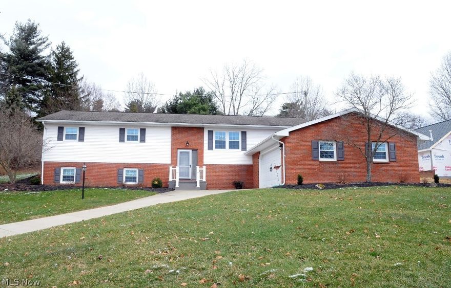 From the moment you pull into the driveway you'll be enamored with the immaculate condition of this home, inside and out. Many updates throughout make you feel like it's a brand new home. The cook of the house will be mesmerized with the new kitchen cabinets and countertops, accented with stainless appliances, an island with breakfast bar and stainless farmhouse sink. The inside has been freshly painted throughout and all of the interior doors replaced. The new floor coverings on the main living level give a fresh, new exciting look. The finished basement is so fresh and spacious with plenty of room for an office work area, a recreation area and TV area. A great place to host those winter family gatherings. The back porch feels like a room itself with vaulted wood ceiling and spacious sitting area overlooking a park-like backyard. It's so serene you'll forget that you're still in town. This amazing home won't last long. Property taxes without homestead and including the $6.00 MWCD asse