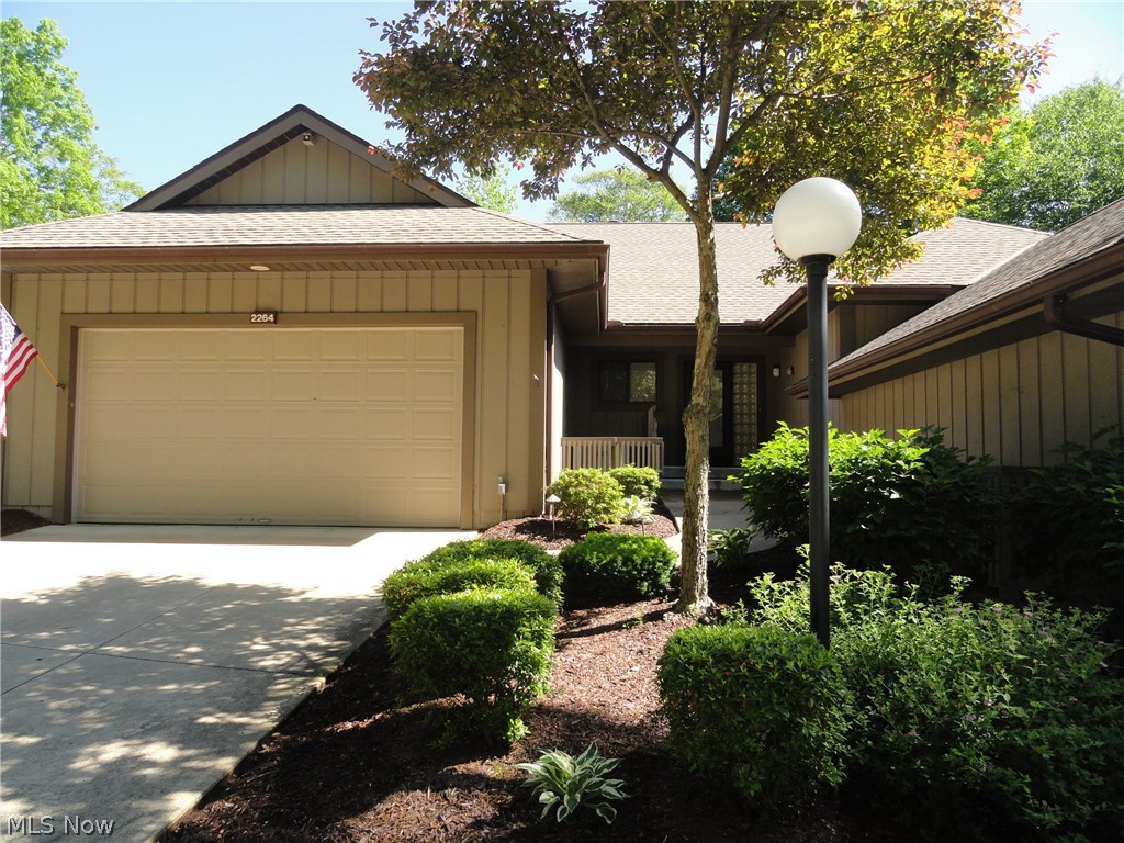 Spectacular ranch condo situated in "The Crossings," a highly desirable community nestled on the edge of the Cuyahoga Valley National Park. The unique floor plan is light and bright and open with vaulted ceilings and skylights plus windows and sliders across the back allowing plenty of natural light. Foyer entry with beautiful wood floors that continue into the kitchen and dining room. The great room has soaring ceilings and a beautiful stone fireplace from floor to ceiling and connects to the dining room / kitchen with sliders to the private wrap around deck porch offering breath taking views of the wooded ravine year round. Meticulously maintained by these original owners plus all mechanicals are replaced within 5 years. The community includes a pool and is close to Portage Crossings for groceries, movies and restaurants. Won't last!