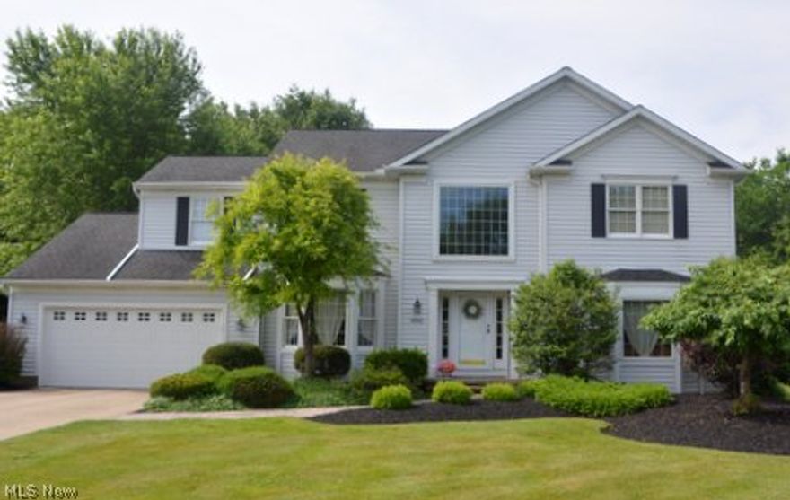 Pristine Colonial in the  Huntington Woods development. Beautifully manicured lawn and gardens with a nice wood deck that steps down to a stone patio. Home features a formal dining room with crown molding with a living room that opens to the family room with a wood burning fireplace. Large eat-in -kitchen with ceramic floors that leads to the laundry area and private office.  Master bedroom has walk-in-closet and large master bath with jet tub. Newer A/C (2010), garage door, some newer windows and interior doors. Very Well Maintained Home.