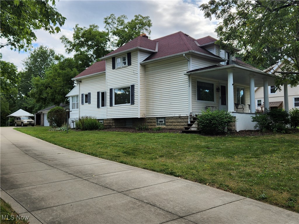 Come and see this beautiful, comfortable and country style home in the city of Independence with so much to offer. This house has a newly upgraded modern kitchen on the main level with new cabinets, granite counter tops, breakfast eating peninsula, island work top, refrigerator, electric stove/oven, hood, under-counter microwave set-up, disposal and dishwasher (all appliances less than 5 yrs. old). First floor has newly refinished solid oak wood floors, (1) spacious bedroom and (1) full bath (separate shower and tub). The upper level has (3) bedrooms ((1) @ 9' x 12' with built-in desk/drawers, (1) @10' x 13' with a closet and (1) @13' x 21' with built in drawers and a closet) (1) half bath and a large walk-in closet/storage area. The basement is unfinished and has (1) full bath with a shower, a canning room, large laundry area, work/utility room and an area for a future entertainment room. There is a 120/220V electrical service located in the garage. The home utilities are public sewers, city water, 100A electrical service and natural gas. The hot water heater is 9 yrs old. The home is heated by a forced air furnace which is 20+ yrs old. This home features a fully covered front porch and an enclosed cozy sun-room at the rear entry. The house is situated on a 0.84 acre lot (83' w. x 441' deep) that is surrounded by seasonal landscaping and plantings. There is a circular concrete entertainment patio with privacy fencing and mature trees that provide refreshing shade during the hot summers just south of the rear entry. There is a gas hook-up available for a gas grill. The rear yard has a large flat grassy area with mature trees and plantings that provide privacy from the neighbors and also shading for family functions. The southern portion of the lot slope down to a stream and extends +/-12' past the stream and has numerous full growth trees for privacy. The driveway is a 5 yr old concrete drive with a large turn around that ends at a masonry (2) car detached garage.