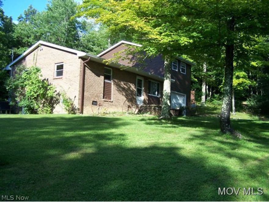 Beautiful brick & vinyl home features 4 bedrooms, and 2 baths. Spacious eat-in kitchen, laundry and mud room. Living room, Electric & propane heat plus wood burning stove. Central heat/air. Garage is 12.5 x 30. Outbuilding is 10x12. Yard is nicely landscaped. Well maintained home-move in ready with a home warranty. Excellent country location with lots of wildlife. Located on 1.07 Acres. HOME WARRANTY included.  Elem: Spencer  Elem/Bus: Y  JrHigh: Spencer Middle  JrHigh/Bus: Y  High: Roane County  High/Bus: Y  Fire: VOL  Police: SHF  ;SQFT=Fin L1:826, Fin L2:385, Fin Bsmt:0, Fin Above:1211, Fin Total:1211, Unfin Above:0;GAR= 1 Car Built In;PRKG= Off Street