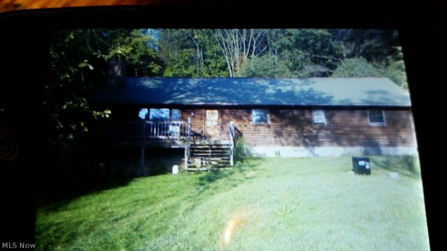 FAMILY HOME IN COUNTRY  SETTING WITH MIXED WOODED AND VACANT LAND. ENTER FROM PRIVATE DRIVE BACK TO FRONT OF HOME WHERE YOU WILL FIND FRONT FRONT SIDE WITH WOODED VIEW. WHEN ENTERING HOME LARGE LIVING ROOM W FML KITCHEN DINING ROOM COMBINED. MASTER BR IN REAR, 2BR IN FRONT FULL BASEMENT W XL DOOR ENTRANCE .