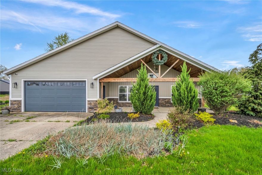 Stunning single family ranch style home in the quiet suburban area of Columbia Station. Minutes from Southpark shopping area. Over two acres of land with a barn.  Front porch area with room for sitting welcomes you to come inside to lead you through the inviting hallway to the kitchen area. Kitchen is fully modernized with a rustic feel and remodeled with newer Kitchenaid appliances: Fridge, cooktop, oven, microwave, and dishwasher. Solid surface counters with tile backsplash, more than enough cabinet space, barn door style pantry, and three person seating at the kitchen island. Kitchen fills with plenty of natural lighting. Laminate and tile flooring throughout for durability and easy cleaning. Main bedroom on first level with walk in closet. Attached to main bedroom is a glamour bath (duel vanity sinks, large walk in shower with soaking tub) creates a calming and relaxing atmosphere. Two larger bedrooms on main floor for guest rooms or office. Two large closets in the main hallway with barn style doors. The very large living/family room with high vaulted ceilings allows for memorable family gatherings or relaxing movie nights. Built in wet bar with fridge for easy access to drinks and snacks. The family room transitions seamlessly outdoors to the covered patio, additional concrete pad for BBQ and finally a fire pit for storytelling and making smores. Large grass and landscaped lot truly gives you the feeling of open space and suburban vibes. Two car garage provides plenty of storage for two cars and equipment including a couple extra parking spaces to the side of the driveway. This ranch is waiting for you to move right in and enjoy all of its amenities. City water and sewer.  Propane heating and fireplace. Whole house was demo'd down to the studs and every inch remodeled in and out.  Washer and Dryer included. https://media.tourdspaceohio.com/sites/lkrmoxg/unbranded