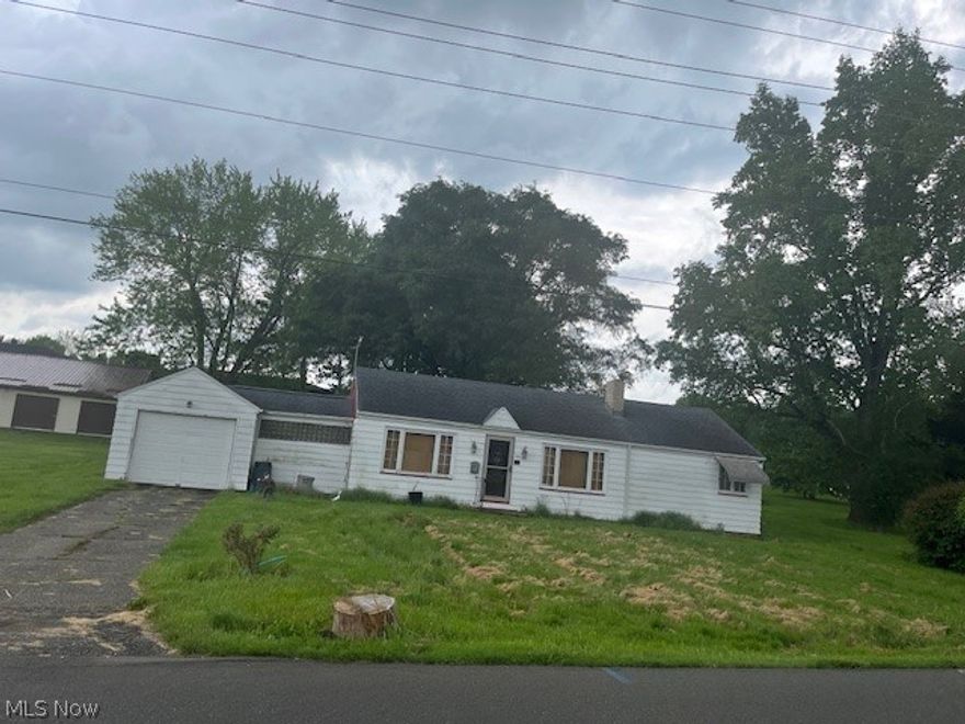Large lot on Southside with beautiful mature trees.  Room to grow with 1.5+ acres.   Property needs to be connected to New Phila sewer services.  Great investment property.