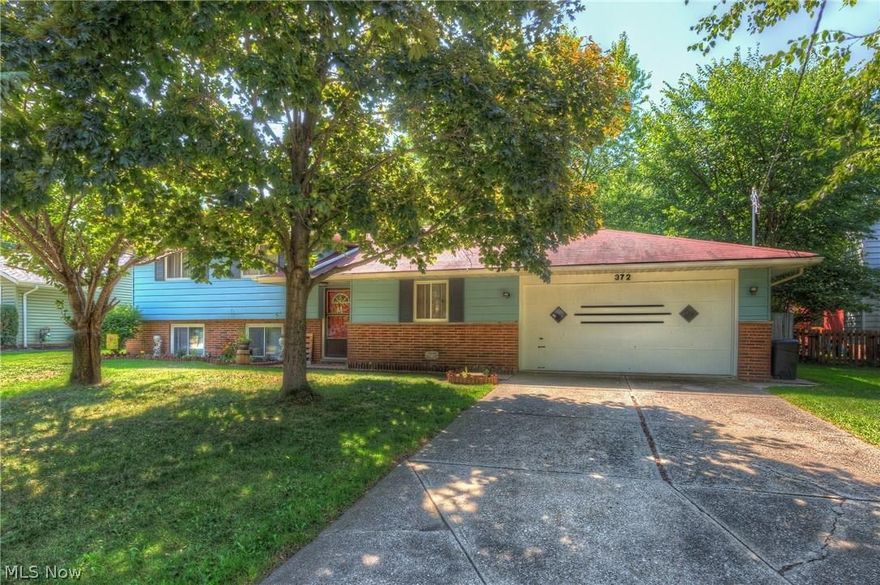 Move Right In to This Spectacular Split Level Home in a Desirable Richmond Heights Location! ***Check Out the 360 Degree Panoramic Virtual Tour!*** Tiled Foyer Entry! Updated Kitchen with Newer Oak Cabinets, Countertops, Ceramic Flooring, and Viking Range Opens to a Formal Dining Area! Living Room Space Features Sliding Glass Doors to the Concrete Patio and Fenced in Yard! Upper Level Features the Master Suite with Updated Master Bath and Walk In Closet! Two Additional Bedrooms and an Additional Remodeled Full Bath Complete the Second Floor! Spacious Lower Level Family Room! Fourth Bedroom and Half Bath Complete the Lower Level! Newer Carpet and Fresh Paint Throughout! Fenced in Yard with Matured Trees and Vegetable Garden! Updated Furnace and Electrical! Home Warranty Included! Private Street! Call for Your Private Showing Today!