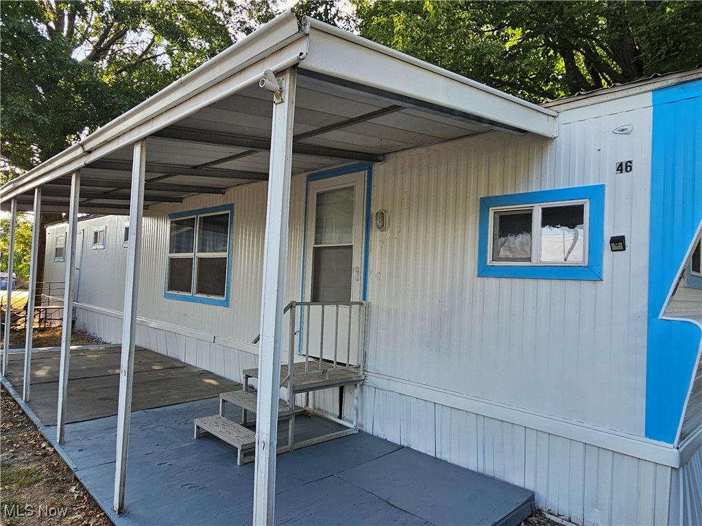 Recently remodeled inside & out! Move in ready this mobile has an inviting living room, eat in kitchen, 2 bedrooms and a full bath with laundry hook up. The location is great! You can sit outside on the covered patio that has a beautiful view looking over at Springfield Lake! Convenient to shopping, eateries, minutes to the expressway and much more! Don't wait to schedule a time to take a look because this one is sure to move quick! Mobile is being sold as is, no warranty.