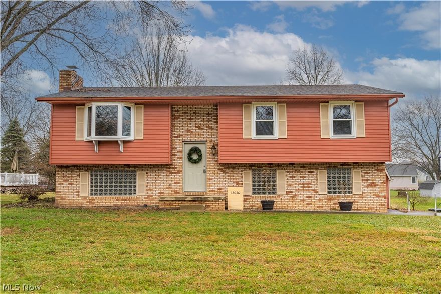 Beautiful and charming bilevel located in a desirable Lake Township/Lake Schools neighborhood. You will love the open updated kitchen, 3 bedrooms, 2 baths. New LVT flooring, Quart counters and more, Heart warming family room in the lower level with fireplace and full bathroom. Huge yard, deck, central air, backyard barn and tons of updates. Call today for your private showing.