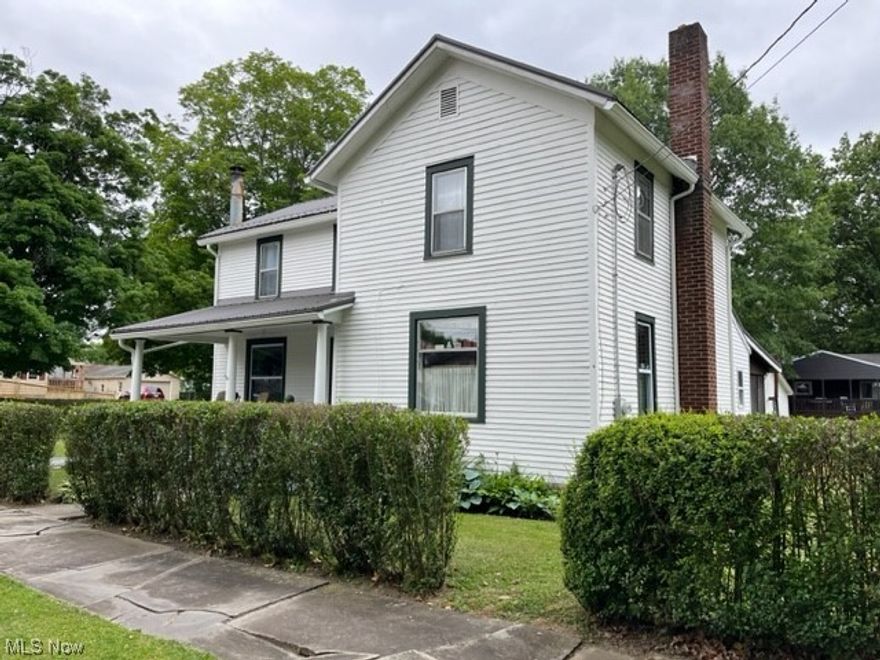 "Buyers Dream" Large lot includes 5 parcels. 3 Bedrooms, 1.5 baths, Front and back porch. PATIO, Family room has a wood burner, living room, eat in kitchen 15 x 12, over sized first floor laundry 24 x 7, Attached screened porch 12 x 12. Central air. Remodeled bath in 2021. Gas furnace in 2013. New metal roof 2021. Huge garage 38 x 20 with lots of storage.