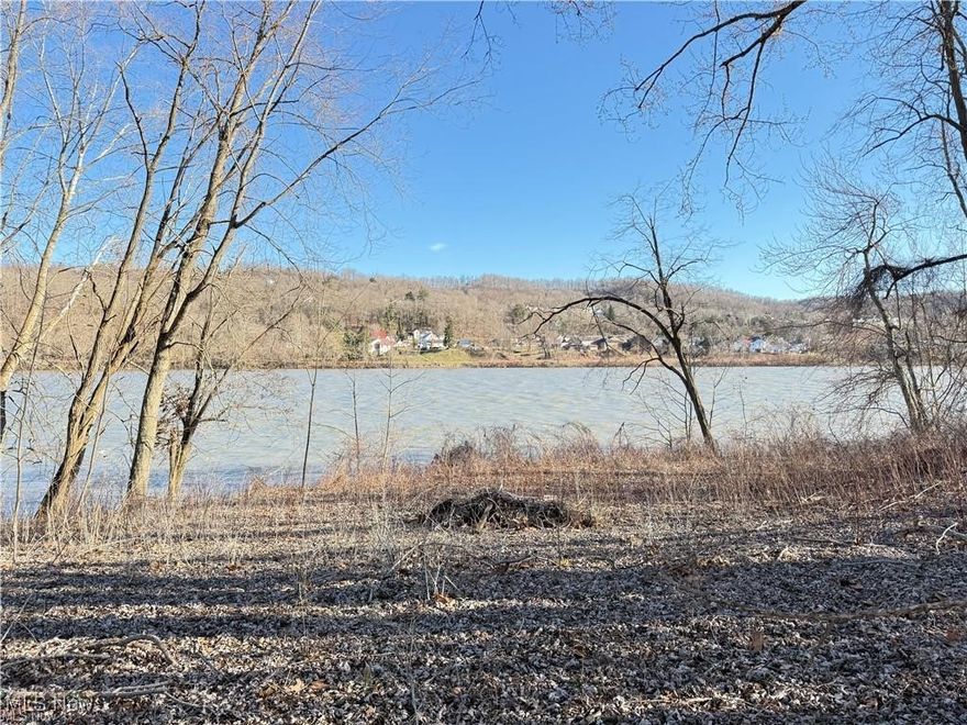 Discover the beauty of the Ohio River with this 5.022-acre riverfront property on Talbot Lane in Sardis, Ohio. Offering breathtaking views and a peaceful natural setting, this parcel is ideal for camping, fishing, boating, and outdoor recreation.

A 560 sq. ft. concrete pad (17.5’ × 32’) provides a solid foundation for your camper, pavilion, or outdoor setup. Electric service is onsite, and public water is available nearby for connection if desired. No septic system has been installed.

Set just off State Route 7, the property offers a rare blend of easy access and riverfront privacy—close enough to town for convenience yet far enough to enjoy the quiet and natural surroundings. Nestled near the scenic expanses of Wayne National Forest, this location places you moments from miles of trails, streams, and outdoor adventures that make this region so remarkable.

Whether you’re seeking a private retreat, a weekend escape, or a basecamp for hunting and fishing, this Ohio River parcel offers exceptional recreational value and investment potential.

Note: Seller retains all mineral rights.

Your Ohio River adventure starts here!