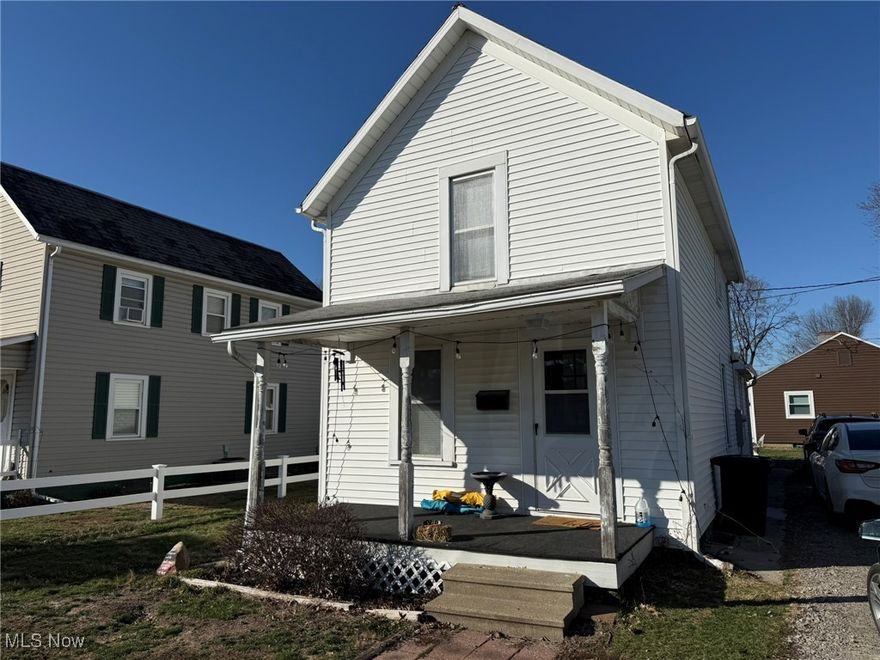 Well maintained 2 bedroom single family home! Wood laminate flooring throughout the main level with decorative fireplace in the living room.  Updated white kitchen with updated counters. Full basement with laundry hook-ups. All vinyl replacement windows throughout. Covered rear patio. Previous tenant's utilities averaged $83 for gas, $106 for electric and $58 for water, sewer and trash monthly. No pets. No smoking. $45 application fee per adult for credit and background check.