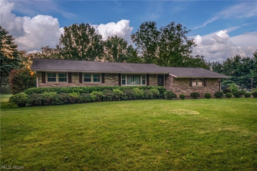 Welcome home to this exceptionally well-cared for brick ranch on over an acre with an over-sized detached garage in desirable Lexington Township!  Enter through the front door and into the over-sized family room, featuring great hardwood floors.  Make your way to the large eat-in kitchen, featuring granite counters, custom cabinetry, engineered hardwood floors, a dedicated dining space with tasteful built-ins, and plenty of storage. Down the hall you'll find the updated full bathroom, featuring new flooring and a dual-sink vanity. Three large bedrooms comprise the end of the bedroom suite, each with great hardwood floors and an abundance of closet space. A convenient half-bathroom completes the first floor. The full, dry basement awaits your finishing touches, with plenty of space to entertain, storage, and an awesome office space. Take the party outside, where you'll love entertaining on the back patio, overlooking the large backyard, featuring a calming creek towards the rear of the