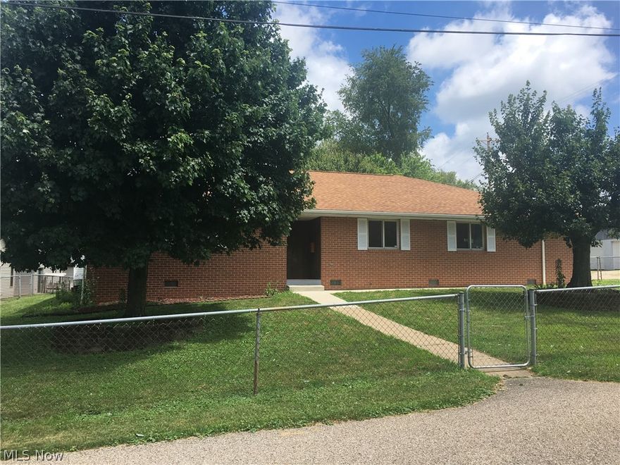 First Floor Living At It's Best! Beautiful Brick Ranch Home, built for the original owner Don Coss. This freshly painted home offers new floor coverings, huge open kitchen and dining area, spacious living room, 1 car garage, off street parking pad and large fenced yard.