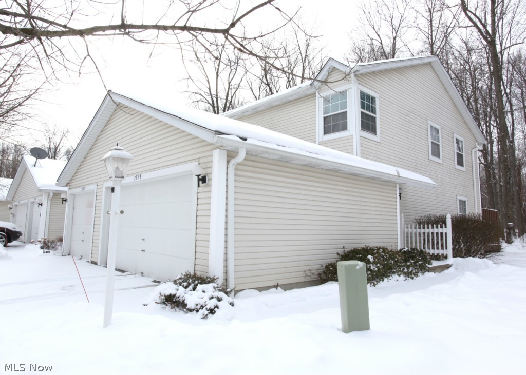 Looking to buy with little down... then you Must check out this Condo. Move in condition. 2 bedroom, 1.5 bath has many upgraded features in kitchens and baths. Bedrooms have vaulted Ceilings, New furnace and Roof. Finished recreational room in basement. Attached garage and a rear private deck with a wooded scenic view. A definite must see! No work here, just enjoy. Very close to restaurants and shopping. Great price for area.