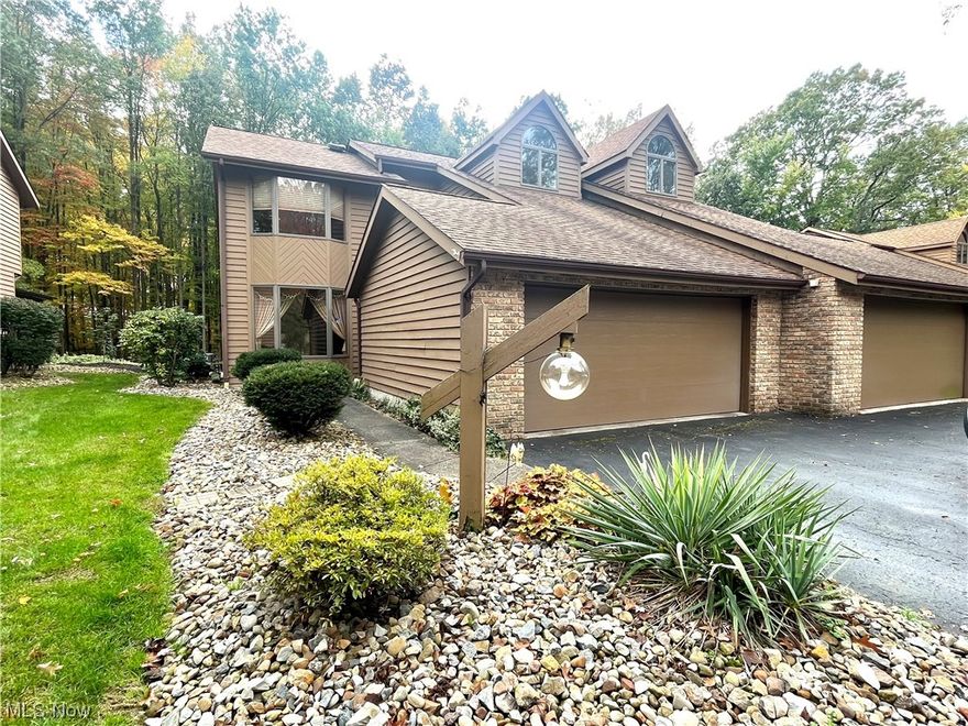 Live the good life in this fantastic Avalon Trail condo located just minutes from shopping, dining, golf and tennis. Featuring an open floor plan, vaulted ceilings and skylights for plenty of natural light, this home offers three floors of living space plus a private backyard with deck. The main level provides a dining room with large bay window, fully-equipped kitchen with ample cabinet and counter space, family room with fireplace, and a cozy wood-paneled 3-seasons room perfect for relaxing. A guest bathroom with tiled shower and laundry area are also conveniently located on the first floor. The second floor features a large loft area and catwalk overlooking the family room. Two spacious bedrooms, both with walk-in closets, share a Jack & Jill bathroom with dual sinks. The basement provides even more usable space with a rec room, kitchenette, utility room and crawl space for easy-access storage. Other highlights include a two-car attached garage, new HVAC, new hot water tank and brand new carpet. If you think moving to a condo means you'll have to sacrifice space, style, storage or privacy, this unit will make you think again!