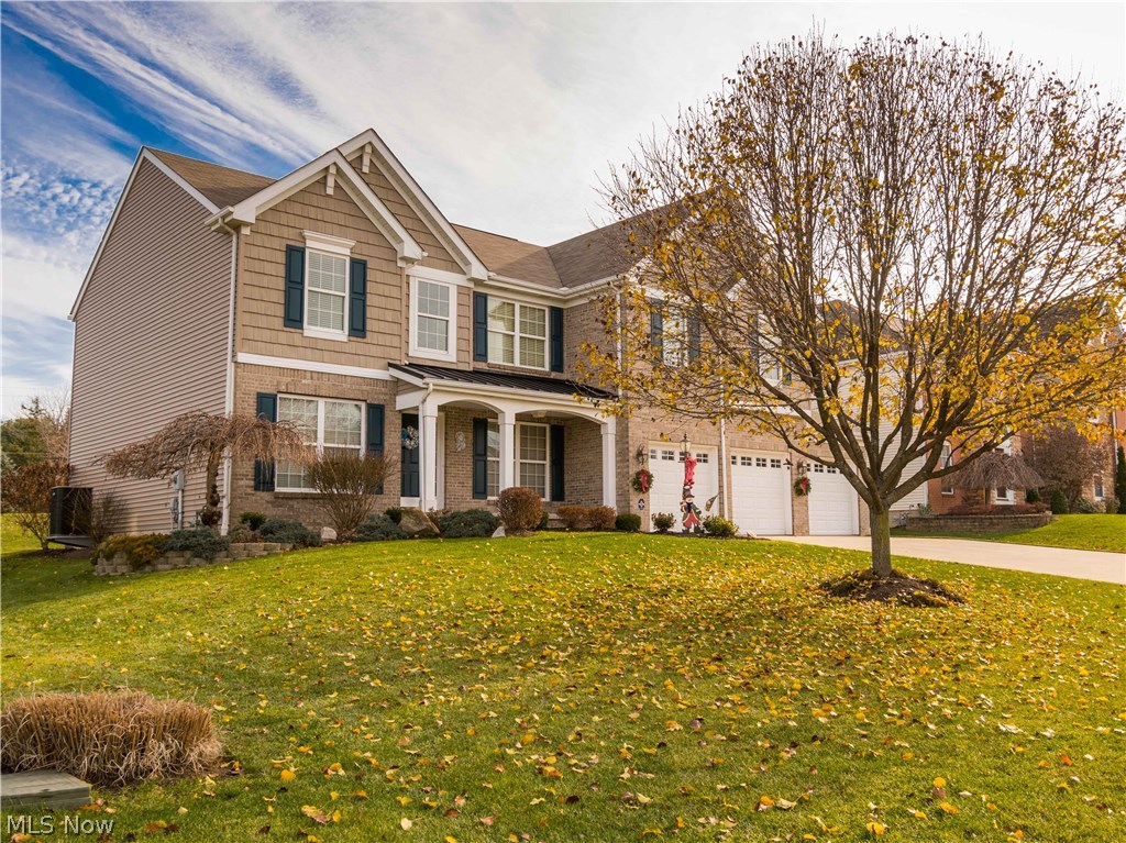 Beautiful colonial with 4 BR/2.5 BA built 2006 w/2859SF & 3 car garage...so much to offer!! 2 story entry w/plant ledge & wood floor* 2 story great room w/wall of windows & gas log fireplace* Vaulted sunken sunroom wrapped w/windows, plant ledge, wood floor & access to paver patio* Kitchen & breakfast room w/maple cabinets, wood floor, desk, island/breakfast bar, walk in pantry & fully applianced (refrig, range, microwave, dishwasher & disposal)* Formal dining with crown molding* Den with crown molding* 1st floor laundry with cupboards & sink* Volume ceilings (1st floor)* Vaulted master with sitting area, plant ledge, large walk in & double door entry* Master bath with garden tub, shower, double vanity & lovely stained glass window* 3 additional bedrooms, guest bath & cat walk overlooking foyer & great room complete the 2nd floor* 6 panel masonite doors* Arched doorways* Ceiling fans most rooms* Wired for security system*Huge unfinished 12 course basement, plumbed for bath, poured wal