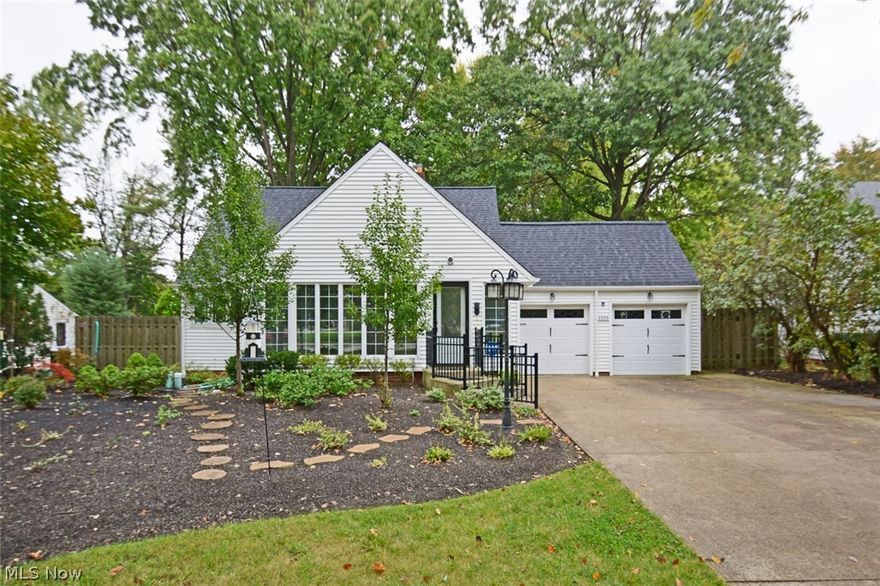 Welcome to this delightful well-maintained cape/master bungalow surrounded by a luscious professionally landscaped yard with towering shade trees and enclosed by a 6’ privacy fence. Quality and good bones throughout, great floor plan with expansive sunroom, large fenced patio, cozy living room with corner fireplace and enclosed bonus room. Valuable big ticket upgrades include (but are not limited to) updated electric 2018; new roof in 2013; two remodeled baths 2016-2013; gorgeous full-house Pella windows and doors 2015-2013; new garage doors & openers 2014; high-grade HVAC system 2008; range & refrigerator 2015. Original hardwood floors under carpet are just waiting to be exposed! Full basement with laundry area and partial Nature Stone.   NOTE:  Square feet of 1907 includes 1392 square feet in legal description as well as 515 square feet of year-round living space found in the finished sunroom and enclosed front porch areas which are being heated.