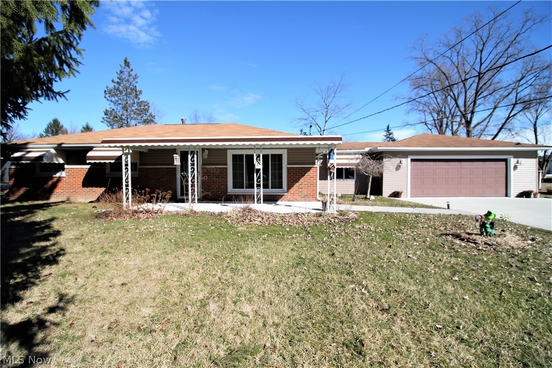 Welcome home to this fabulous three bedroom one full bath ranch home. There are so many updates such as the driveway, windows, awning, vinyl siding, gutters, electrical, HVAC, and duct work all updated in 2016. WOW! HVAC/AC 2015, new sewer line. The hot water tank, garage door, front door and rear door updated in 2019. The great room has large front window and leads into the bright kitchen which has eat in area and plenty of cabinet space, ceiling fan. The covered breezeway with ceiling fan and large windows is a great place to enjoy the sunshine coming in. There are three bedrooms which all have closet space. The full bathroom has new toilet 2019. The two car garage is attached with door opener and electric. There is a huge backyard which has a great view of the lake and a shed for all those out door tools. The front of the home offers an awning to enjoy the beautiful scenery.