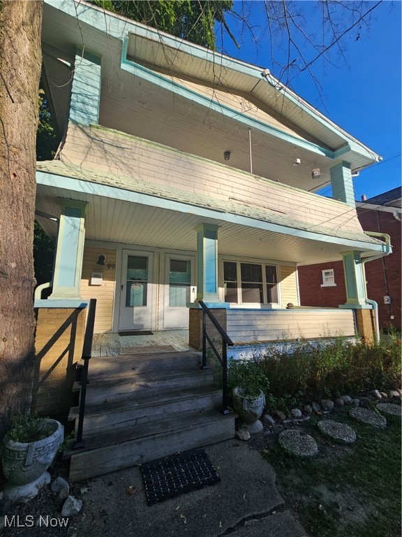 Welcome to 97 Hawthorne Ave! This spacious, ground-level unit is ready for you to move right in! The covered front porch is perfect for enjoying the outdoors of this quiet street. Enter through the front door to see hardwood floors throughout. All windows are vinyl, allowing for efficient utility costs. The kitchen recently got a brand new stainless steel refrigerator and stove. 2 bedrooms are separated by your full bathroom that just got new flooring installed. The unfinished basement will soon have a washer and dryer available, so you don't have to leave home for laundry! This home will also be getting a new driveway soon, and parking in the back of the home will be available. Be walking distance to Highland Square, Mustard Seed Market, Akron Public Library, Rocknes, and Lebron James' House Three Thirty. Don't miss it, call today!