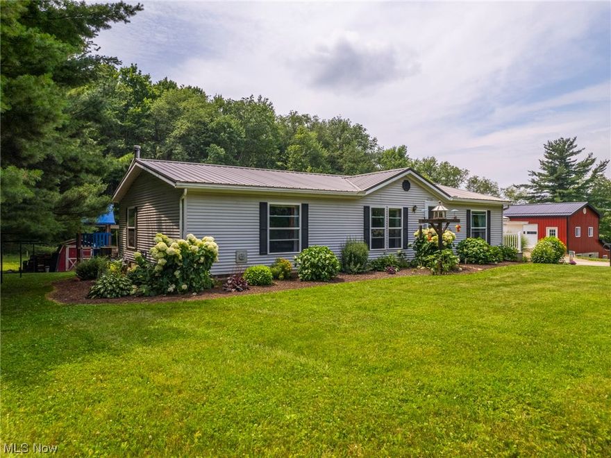 Located in the country and only minutes from Dover and Sugarcreek is this beautiful 2 acre property with a 2 bedroom, 2 full bath double wide home with open living room, kitchen, full basement with cabinets and canning cellar, and a nice big back patio that looks out over the backyard.  There is a 2 car detached garage with side rooms for gardening and wood shop.  The property has a large garden and fully fenced in pasture, a 2 story 26 x 32 barn with 2 box stalls and tack room built in 2016, and a 16 x 20 fully equipped 4 run dog kennel with in floor heat built in 2020.  Also on the edge of this property is a 2 bedroom, 1 bath fixer upper house.  Mark down the 10th of August to own this nice cozy country setting property.