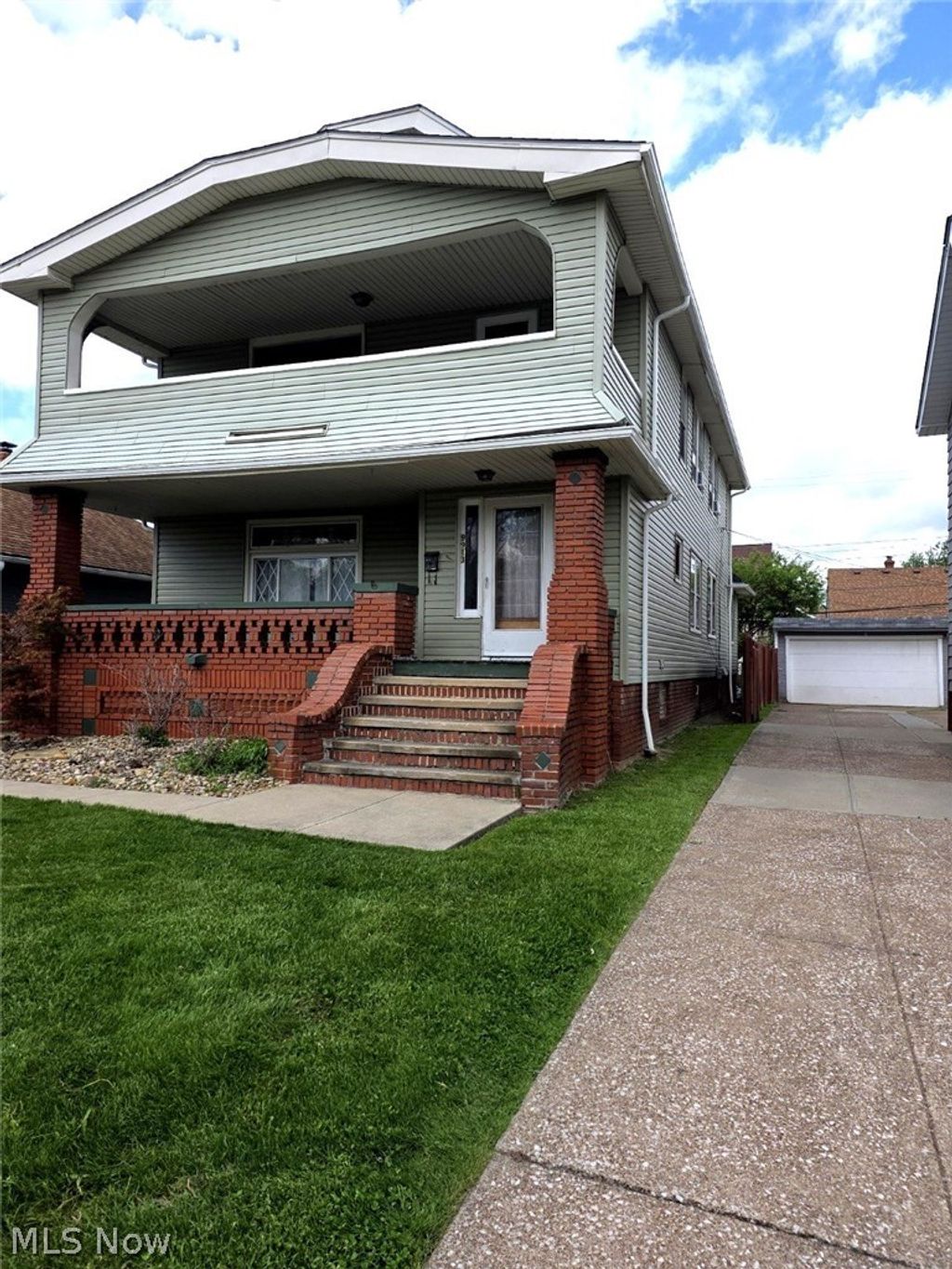 Photo of 9913 Greenview Avenue, Garfield Heights, OH 44125 (MLS # 5205401)