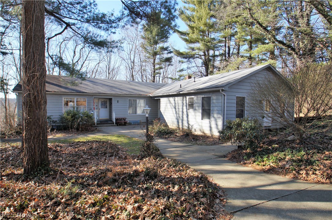 Great owner occupied property or one to add to your real estate investment portfolio. The largest unit #5862 has an enclosed porch off the back of the unit overlooking the beautiful wooded lot. Unit #5862 has a long term tenant but there is rental increase potential. The center Unit #5860 has been completely remodeled, it has a full basement with an attached garage and a walkout to the beautiful back yard. Unit #5860 potential rent could easily be in the $900-$1000 range. Unit #5858 has been rented month to month for many years. Current rent is $475 for unit #5858 it is a one bedroom, kitchen, bath and living room, NO basement for this unit. There is a potential 4th unit in the lower level, but does not have separate utilities. The utilities for this 1 bedroom efficiency are connected to unit #5862. This #4 unit is a 1 bedroom, living room, kitchen and bathroom. It has rented in the past for $500-$575. There is a 2 entrance concrete driveway with the capacity to hold 8+ car