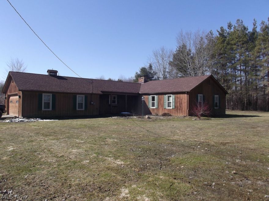 Beautiful ranch home on 5 acres in Thompson.  Living room with brick wood burning fireplace and vaulted ceiling with a rustic wood beam. The Kitchen has tile floors, pantry and built in desk. There is a charming loft area in the dining room which also has a hearth for a wood stove.  The all season room is sure to get plenty of use as it looks over the scenic property which has walking trails..  There are 3 nice size bedrooms including the master with a full bath.  Cherry trim throughout gives the home a rustic feel.  There is a laundry area and a 2 car attached garage.  A newer 20 X 10 barn (2013) is great for all of the yard equipment. There is also a fenced area for pets or a garden.  A second well can be used for garden irrigation.  Some of the updates to the home include Well (2012), Roof (2012), Furnace (2012), Pressure Tank (2011), Windows (2014) and Hot Water Tank (2010).