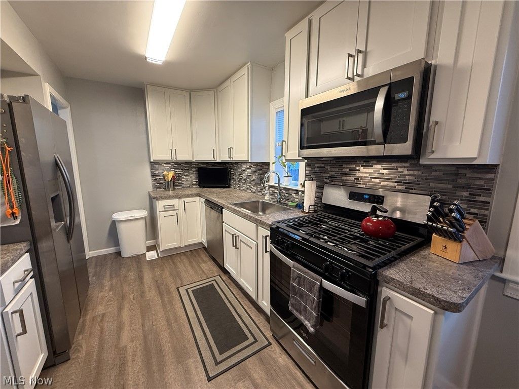 Photo of 411 E 270th Street, Euclid, OH 44132 (MLS # 5190411)