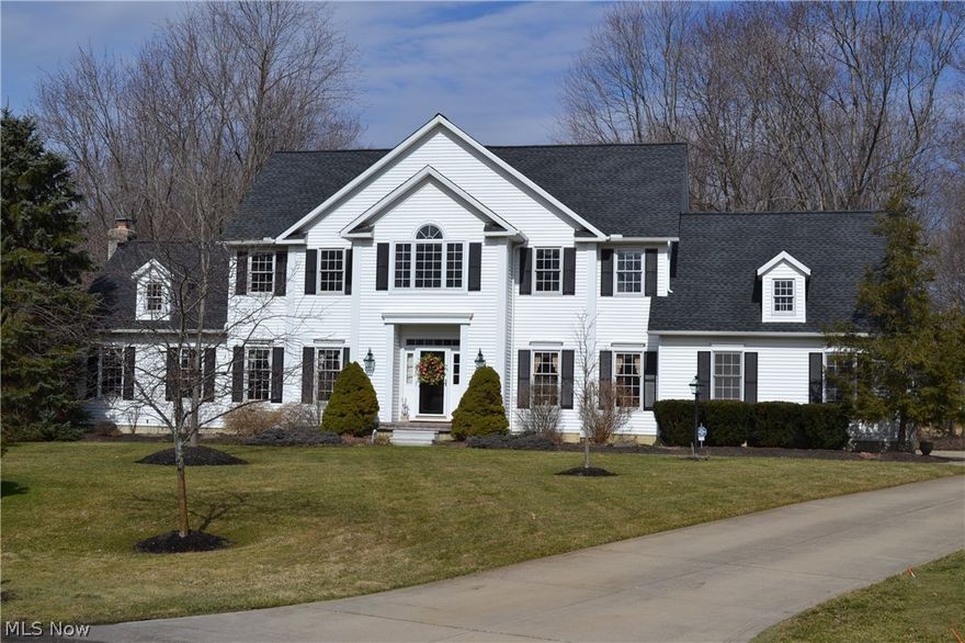 Stunning Colonial on a private park-like yard. Fabulous open floor plan features 4 BR, 2.5 baths and over 3500 square feet of living space. Sunken, vaulted family room with a cozy brick fireplace opens to the back deck. Large eat-in kitchen w/center island, stainless steel appliances, granite counters, and hardwood flooring. Stunning formal dining room w/crown and wainscoting, formal living room, private first floor office (could be 5th bedroom) and convenient first floor laundry. Upstairs, you will discover a large master suite including updated bath and a huge closet! Bedroom #2 includes a built-in desk and attached full bath. Two additional bedrooms and the updated main bath complete the second floor. Finished lower level includes a rec room w/ bar area. Tons of storage space! Stamped concrete patio and composite deck overlook the gorgeous, private backyard. Immaculate and extremely well maintained w/new roof, furnace, A/C and hot water tank! New carpet on the 2nd floor. Great locat