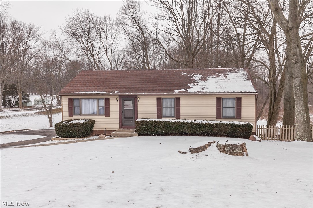 You will not want to miss this raised Ranch home located in Tallmadge. This home has 3 bedrooms, 3 full bathrooms, close to an acre lot, and over 1200 square feet. Walk right in to many updates, including: new flooring on the first floor, fresh paint, light fixtures, updated kitchen with stainless steel appliances and new counter tops, and as well as updated bathrooms. Other updates in the house include: Furnace and Hot water tank which are 1 year old, new AC motor and compressor, new 200 amp electrical panel, and the roof is 10 years old. Located near 76, and not far from the Tallmadge Circle. Call to schedule your own showing today!
