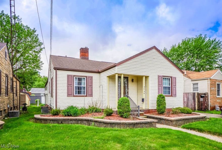 Affordable living starts here in this 3 bedroom ranch full of character and potential! Archways lead from the vestibule entry into a comfortable living room with a decorative fireplace and a dining room featuring chair rail detail, both with hardwood floors under the carpet. The kitchen includes appliances and a brick accent wall that adds a touch of charm. All three bedrooms are nicely sized with shared use of the full bath. Downstairs, you’ll find laundry hookups, a utility sink, and plenty of storage. The landscaped yard and detached one car garage add to the appeal. With a newer roof, siding, and windows, some simple cosmetic updates will go a long way. Call today to take a look!
