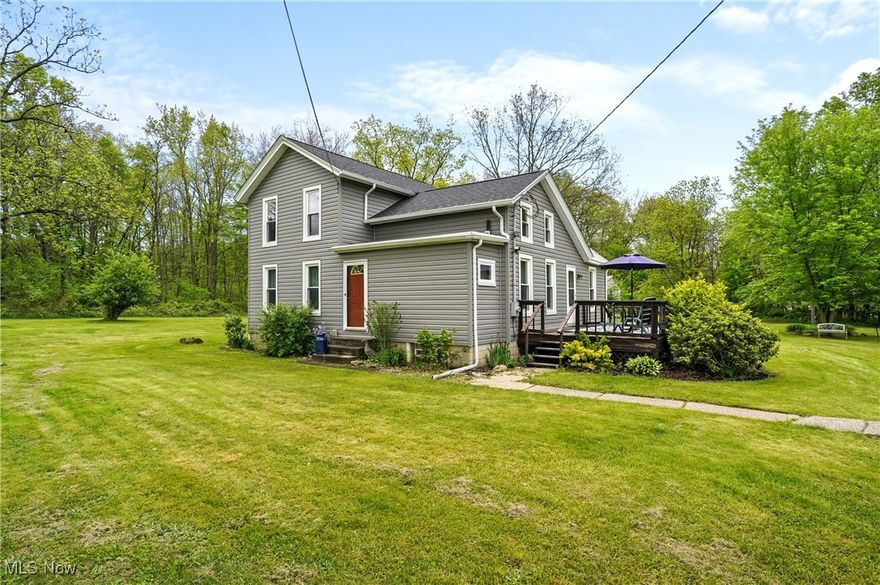 Country farmhouse with many updates! New Pella windows "2022", updated septic system "2020" New roof "2022", New carpet "2022", New siding "2022", Waterproofed Basement "2019" - basement waterproofed warranty transferrable,
ADT security system, house is wired for generator.
Nice treed private lot contains 3.7 acres of land right next door to the Berlin Lake, Army Corps of Engineers land.. This property has a 26 x 60 block outbuilding. There is no zoning so it could be used for a commercial business. 
Kitchen is loaded with cabinets and also has a pantry. First floor laundry room, formal dining room, and a living room. One first floor bedroom, three more bedrooms on the second floor.