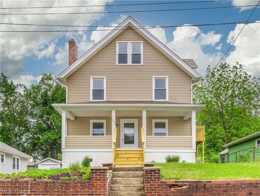You will feel right at home in this 5-bedroom, 3 bath Colonial fully remodeled in Ellet! Relax on your covered front porch in the summer. As soon as you enter you will notice how bright and roomy the living room is with new carpet, a working brick exposed fireplace with built in shelving. The dining room flows from the living room for large gatherings with a window, offering even more storage and room to sit in. In the kitchen recently updated you will find stainless steel appliances, tile backsplash, recessed lighting, white cabinetry, and new flooring just waiting for you to prepare your favorite meals in. 1st floor laundry and new full bathroom with so much storage space ideal for any new owner! Off the kitchen you will love having that extra enclosed space that could be used for a mudroom, sitting room or personal space that leads you out to your new deck. Upstairs on the 2nd floor you will love having your own private master suite with new carpet throughout, on suite master bath with separate vanities and a jetted tub painted in neutral colors waiting for your personal touch. 2 more nice size bedrooms with another full bathroom to complete the 2nd floor till you get to the 3rd floor for 2 more bedrooms and a small sitting area to complete the inside of this magnificent home. Outside you will adore the new deck with a fenced in yard for privacy. So many Updates to name. Schedule your private showing today. Won’t last long.
