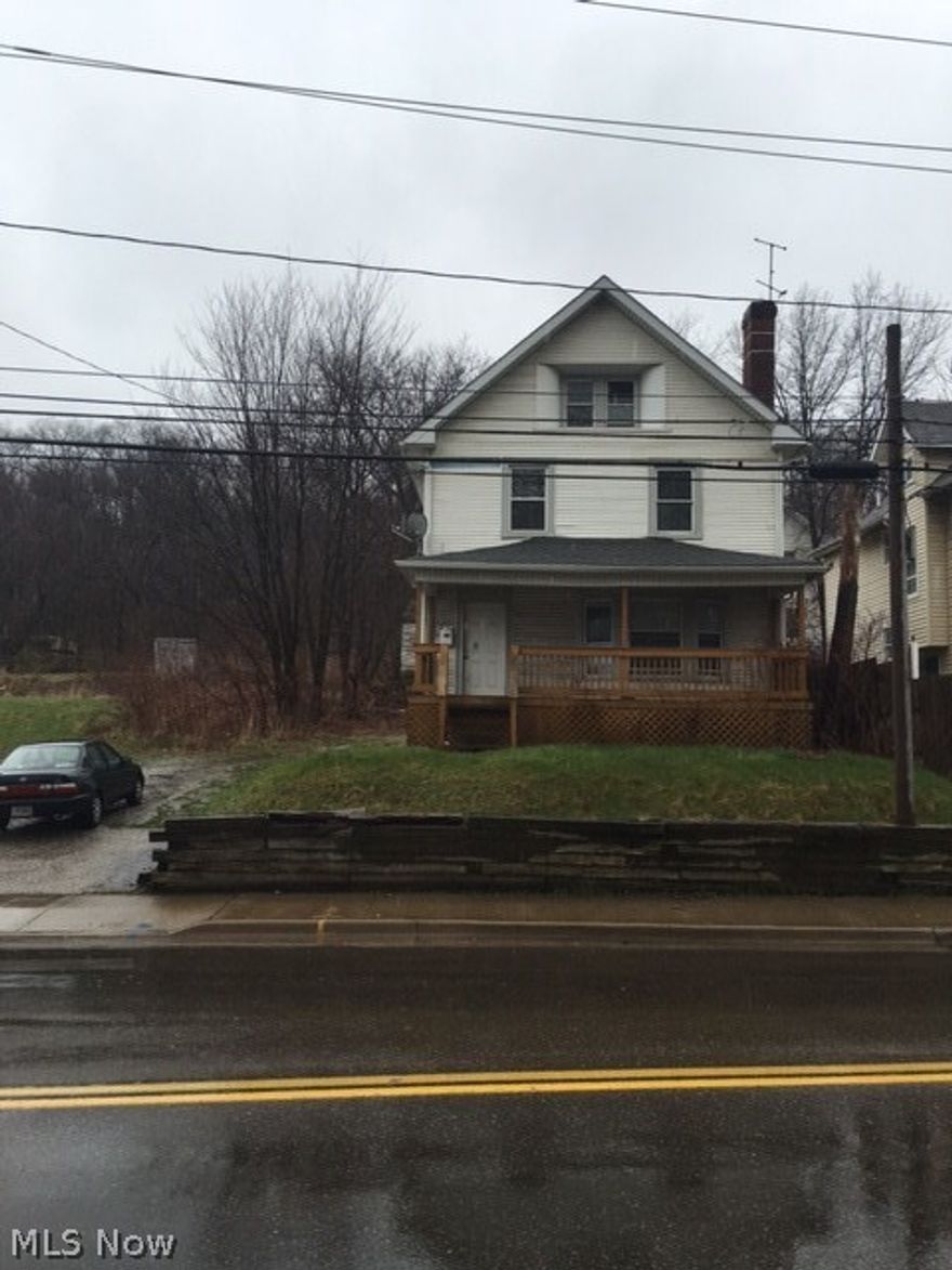 Needs cosmetic work in the interior of the house. Newer kitchen fixtures and newer bathroom fixtures. This large 3 bedroom with  finished Attic features large Living room, Dinning room, Kitchen and bath.  Exterior have newer windows, Vinyl Siding and roof. Nice wood front Porch with plenty of room.Large lot. This needs a little tender loving and care. Great Investment property. Call Richard at 330 351-22367 for private showing.