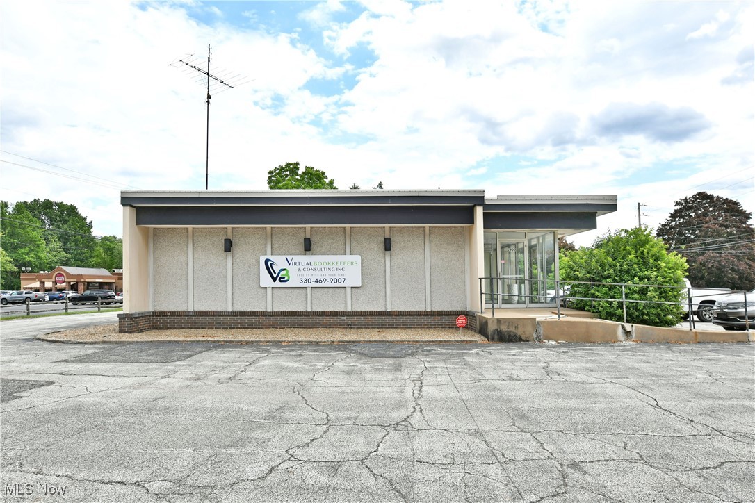 Location, Location, Location! Put yourself in a high traffic hotspot with this advantageous Warren office building! Utilizing
its cross-street configuration the bustling intersection guarantees excellent visibility at red lights with prominent signage
opportunities along with ease of access to the sizeable parking lot. Inside, a glass lined main vestibule separates the
entrance as you make your way into the sun washed lobby. Dual clerical windows offer easy check-in and managerial
office space as a pair of locking doors separate the two conjoined halls of available rooms. These include a breakdown of
18 patient rooms total to include a main operating room with X-ray lab provisions, an oversized lab area, two smaller
patient exam areas, a custodial offering, electric and switch room, a break area with kitchen and wash/sample room. Four
bathrooms include a family and employee only provision. Two separate storage outlets include closet space near
basement access. A second rear entry point is available at the main lab. Call today for more information!