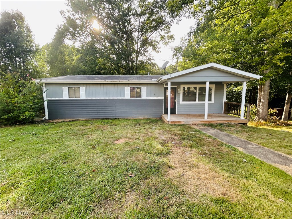 Charming 3-bedroom, 1.5-bath home with tons of extra space in basement and a 1-car attached garage. Close to all the amenities of the town of Spencer. Stay cozy by the wood burning fireplace and enjoy year-round comfort with central heating and AC. The large fenced backyard features a playground setup, perfect for families or pets. Plus, there is an additional office building with income-producing potential! Previously used as a dog grooming business, it can easily be converted into a hair salon, small rental, or other business opportunity. A perfect blend of home and business potential. Call the listing agent today for an appointment to view!