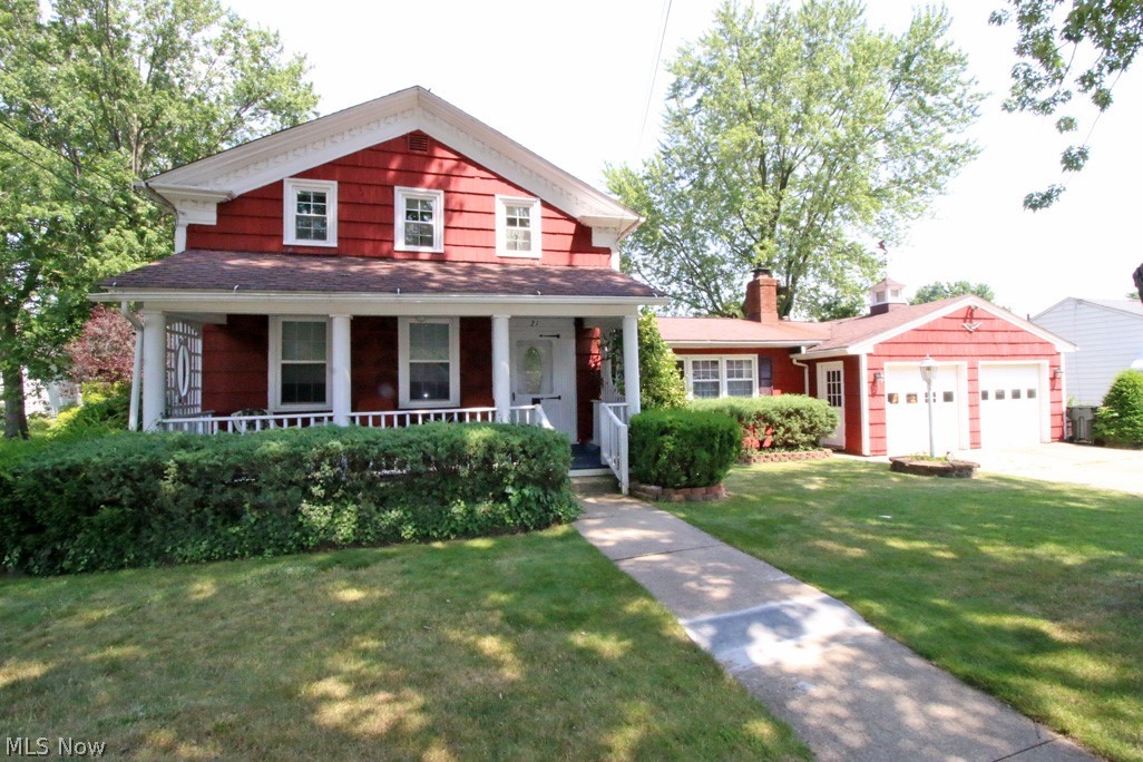 What a fabulous opportunity to own one of Mogadore’s oldest homes with so much history! The home offers so much character and is highlighted on the Mogadore’s Historical Society page in Facebook. If you love old style charm this is the home for you! Check out the awesome front porch graced with large pillars lending itself to the timeless beauty of the late 1800’s. In the 1960’s a family room was added and attaches to the 2-car garage. The family room has built-in shelves and a woodburning insert in the fireplace which offers lots of heat in the cold winter months making it a cozy room. The spacious living room opens to the formal dining room. At the back of the home is the kitchen that opens to an enclosed porch as does the family room. The upstairs has 3 bedrooms and 1 full bath. The private backyard is simply beautiful and has a patio overlooking the privacy of the yard. There is a 19x10 shed with pull-down stairs leading to more storage. There is electric in the shed. The home as v