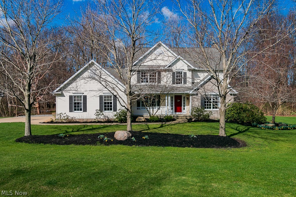 Are you looking for a beautiful home that is in a great neighborhood AND has plenty of land? If so, look no further. This 5 bedroom colonial will amaze you from inside out. The property is truly a nature oasis that is complete with over 2 acres of wooded land, a creek, large outdoor deck and gravel patio that is perfect for night time bonfires.
Step inside and you'll be welcomed by a bright foyer, spacious dining room and large front room that can be used for an office, extra living space or even a perfect playroom for the kids. Continue through the home and you'll find the living room that is complete with a cozy fireplace and stunning view of your backyard paradise. Next, head into the open kitchen. It's complete with a large granite island, eat-in space, modern white cabinets with plenty of storage and a sliding glass door out to the massive deck. Off the kitchen is an updated half bath, main floor laundry and last but not least, an owner's suite OR in-law suite. Head upstairs to