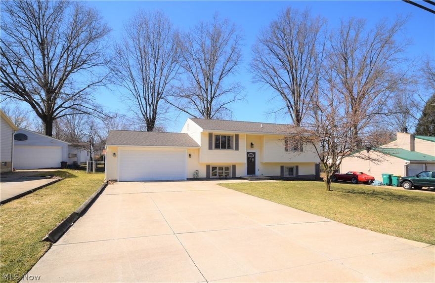 Welcome to 4178 Vira Road in Stow! You'll fall in love with this gorgeous 4 bedroom, 2 bathroom home that has endless renovations throughout. Step into the eat-in kitchen and you'll immediately be drawn to the premium kitchen flooring, stainless steel appliances, and beautiful counter tops & cabinets. You'll be pleased with how much counter and cabinet space the kitchen has to offer -- plus it has a breakfast bar! The sliding glass doors off the kitchen lead to a wooden deck overlooking the fully fenced-in backyard. The living room has a large window overlooking the front yard that allows so much bright, natural light into the home. All four bedrooms are nicely sized. Both bathrooms have newer tile flooring with gorgeous vanities and updated lighting fixtures. The fully finished basement offers a bonus living room, finished  utility room, and access to the garage and triple-wide driveway. This home has a new AC unit (2018) and new roof (2017). This home has neutral decor throughout and