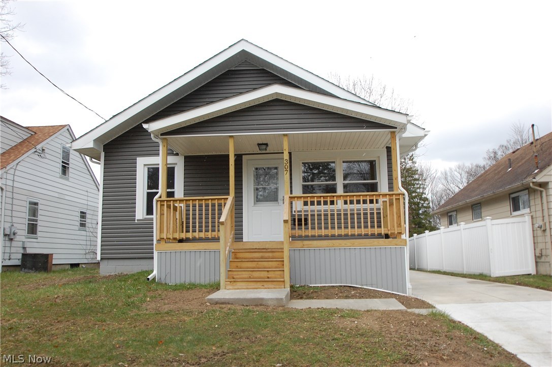 Totally renovated 2 bedroom ranch home. Features living room, eat in kitchen w/ ceramic tile floor, new cabinets and counter tops, all appliances stay, Master bedroom w/ fans. There are Two full baths updated with tile, commode and vanities. The lower level has Rec. room 20x12 with vinyl floor and a 15x10 bedroom with vinyl floor plus glass block windows. Updates 2018 include, roof shingles, vinyl siding, vinyl tilt in windows, all carpet and paint, light fixtures, 2 steel doors and new screen storm doors, kitchen and baths. This home also has a new front deck and new concrete drive. This is a move in ready home with immediate possession.