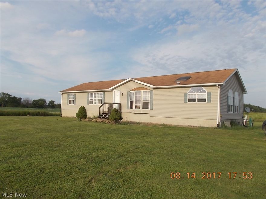 Spacious modular home features over 1800 sq. ft. , situated on over 3 scenic acres. This 3 bedroom, 2 bath home has a full 13 course basement. The open floor plan has cathedral ceilings and a fireplace in the great room. Just waiting for your finishing touches.