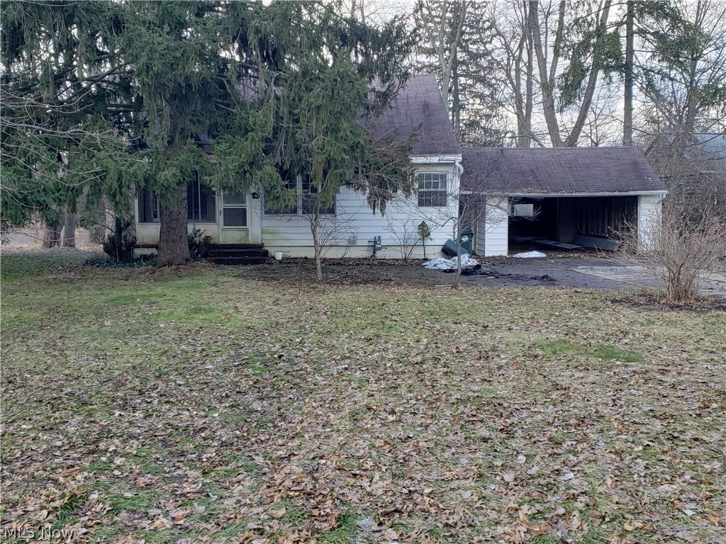 3 Bedroom 1 Bath Cape Cod with a 2 car garage on 1.12 acre lot in North Royalton. This home is 4 minutes north of North Royalton Middle/High School. Also Memorial Park, soccer field and old skate park are behind the schools. A few minutes farther you have Aukerman Park and Stuhr Woods. This home is close to the Turnpike, 71 and 77. This is the handyman special you have been waiting for in this fast paced market. Don't pass up this opportunity. Call for your private showing today.
