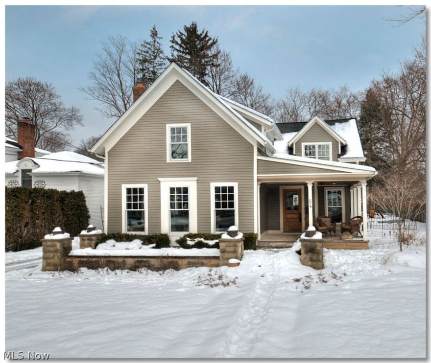 A most incredible & historic home in the heart of the Chagrin Falls village on incredible lot with breathtaking views of the river and waterfalls. Completely rebuilt and reconfigured in '11, this home is in move-in ready condition with an open concept that is perfect for entertaining!  High-end kitchen is a gourmet's dream with top of the line appliances, elegant French country sink & enormous granite center island. Meticulous attention to detail & many custom finishes.  Hickory hardwood flooring installed throughout.  Family room with soaring ceilings overlooks the wooded lot and spacious porch.  Custom wet bar installed with wood salvaged from original home!  Magnificent master suite features 3 closets & bathroom with marble counter, his & her sinks, elegant French tub and free standing shower.  Beautiful full bathroom for every bedroom plus a full bath on first floor. Bonus room behind bookcase door can be used as media room or office.  New ('11) roof, plumbing, electric wiring, duc