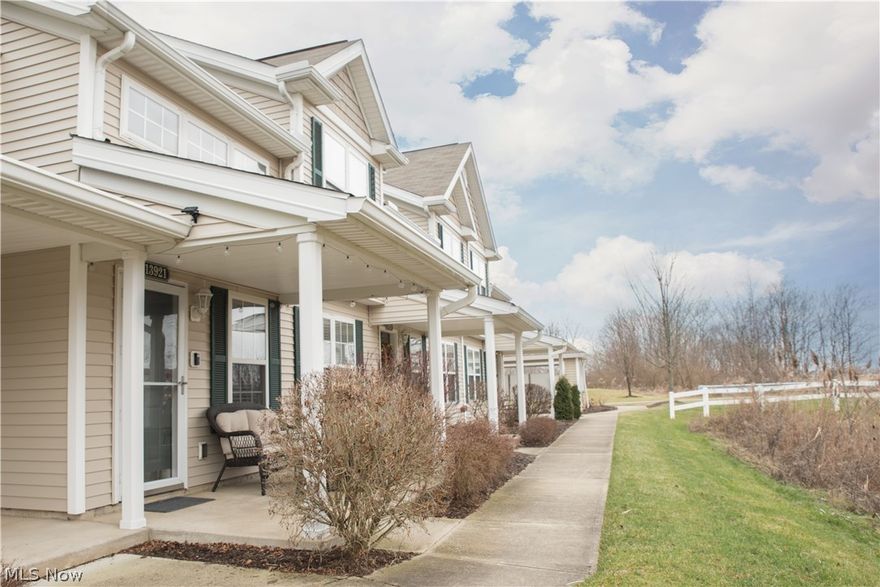 Welcome to this beautifully updated townhouse featuring three bedrooms, two full baths and a two-car attached garage.  Enjoy warm days relaxing on the front porch that overlooks green space.  Enter the two-story foyer that provides fabulous natural light that expands to the open-concept dining room and living room.  The updated kitchen features stainless appliances, painted cabinets, new countertops & backsplash, farm-style sink & faucet, and a breakfast bar.  Both full baths have been updated.  You will find a first floor master AND second floor master!  The upstairs master closet is custom with extra storage space, racks and shoe organizers.  Loft-space and guest bedroom are located on the second story.  Other desired features include Ring Doorbell, smart thermostat, many updated light fixtures and all LED lightbulbs, upgraded touch screen keyless entry, new waterproof & scratch-resistant Pergo flooring on main level, rebuilt garage door opener, freshly painted walls, trim and mouldi
