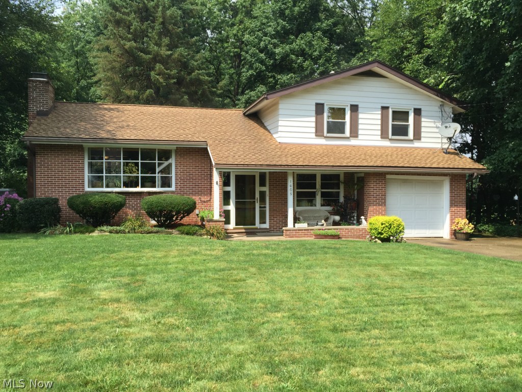 Beautiful brick split level. Located in a very serene private setting. The owner has taken meticulous care of this home and you'll notice the difference from the moment you step into the foyer! Featuring all neutral colors this is definitely move in ready. If you have a large family or love to entertain friends then you'll definitely enjoy the media room, recreational area and large all season room. Gorgeous hardwood flooring throughout most of the rooms PLUS there's a walk out basement with laundry area. The upper level offers three nice size bedrooms and full bath. Enjoy the outdoors? There's a park close by and beautiful English gardens to soak in the sights and sounds of nature. There's also a large shed outside, great for storing lawn and yard equipment. Don't miss out on this great opportunity. Schedule your private showing TODAY!!