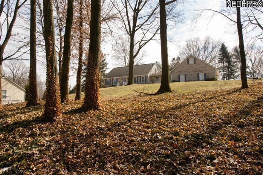 Rare Jackson Twp find!  Nestled on almost a 1 acre lot with a oversized 2 car attached garage PLUS there is a 2 car detached with Eectric, water & gas for the car enthusist! The Schrock kitchen has plenty of counter & storage space!  There are 3 full bath, a rec room, office, HUGE bonus room over the garage!  The home was purchases in 2007 for $255 & have made $40k worth of improvents inclusing all new energy efficient windows, stamped conrete patio, trex covered deck, all new fixtures, updated baths, leaf guard system installed, appliances, HW heater, boiler reconditioned & so much more!